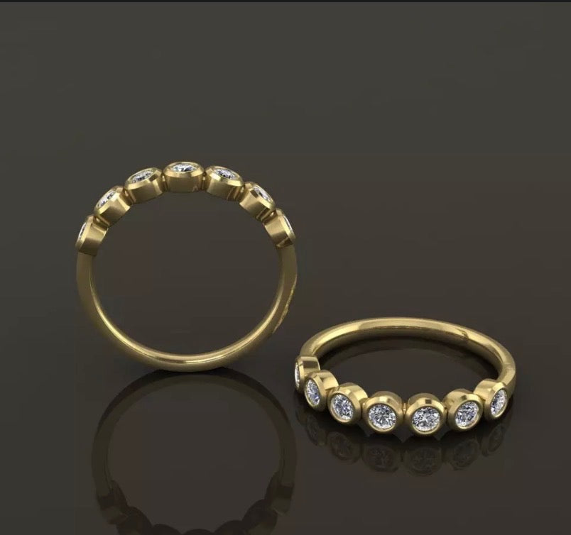 Bezel-set diamond band, crafted in beautiful 14K gold